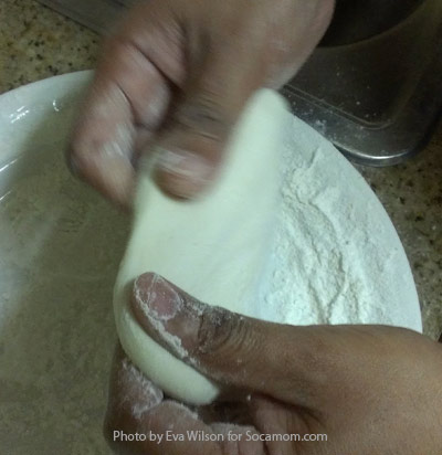 Stretch dough into disk shape.
