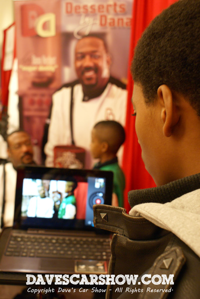 The Boy filming Mr. Social and Dana Herbert at the Delaware Auto Show