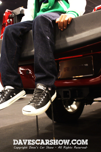 End of a long day - taking a break in the bed of a Dodge Ram at the Delaware Auto Show.