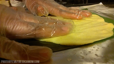 Flattening the cornmeal for pastelles  ::  Socamom.com