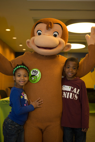 The kids with Curious George at PBS Headquarters :: SocaMom.com